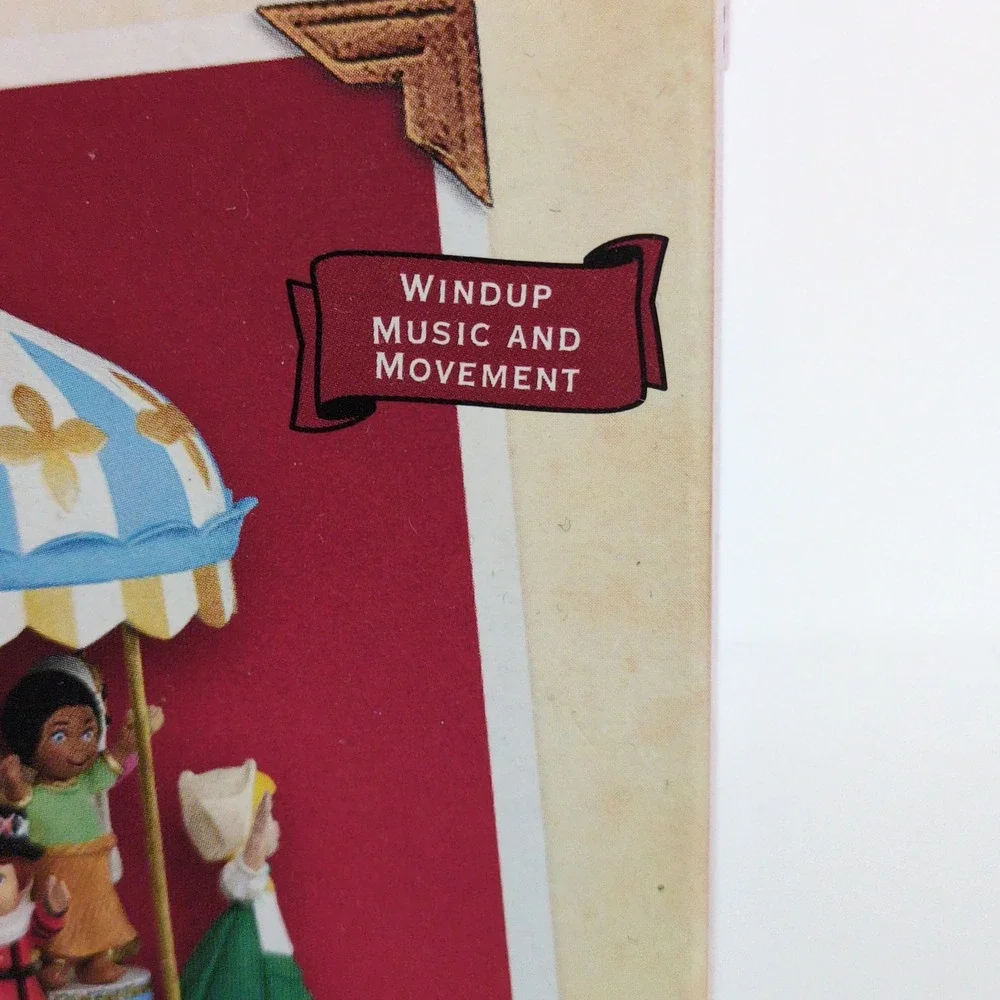 Hallmark Keepsake Ornament Disney Small World Wind Up Musical Carousel 2004